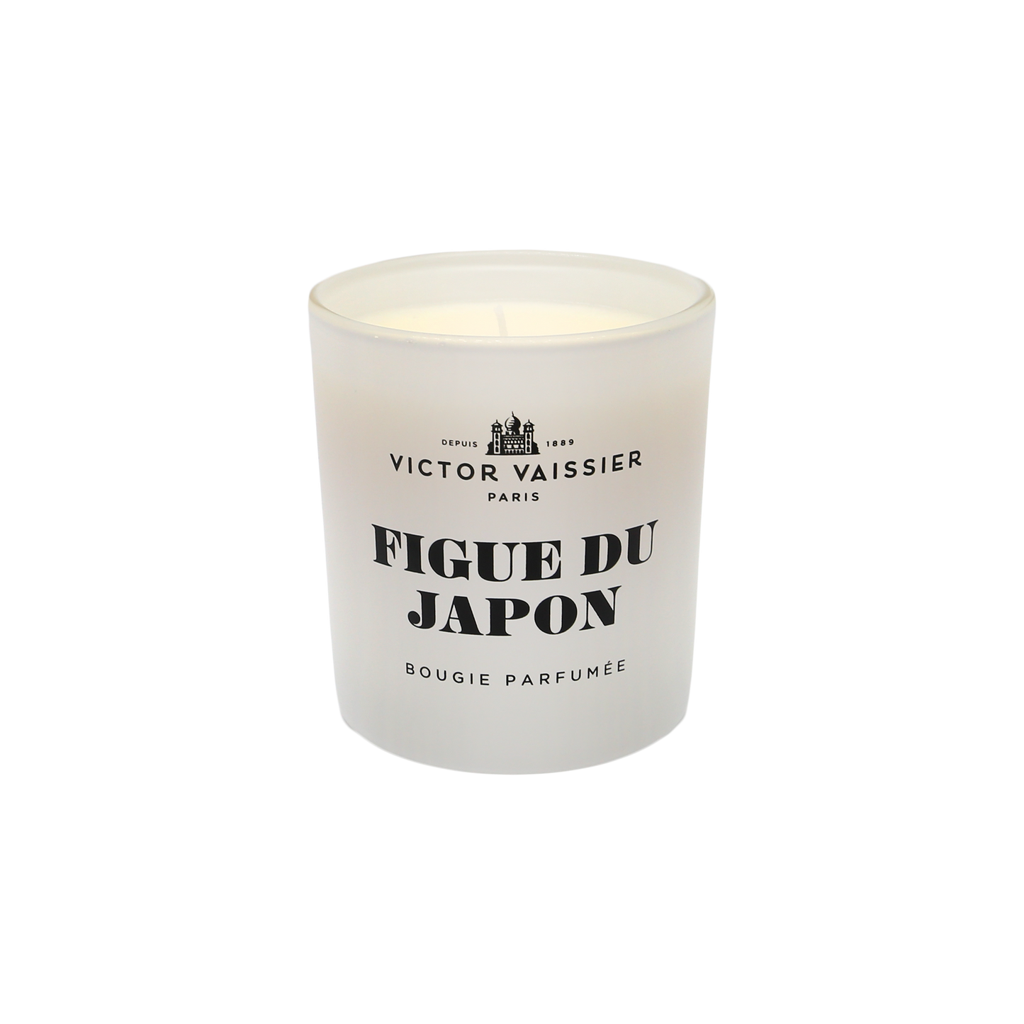 Doftljus figue du japon i glasburk med stilren etikett – exklusiv heminredning och stämningsfull doft