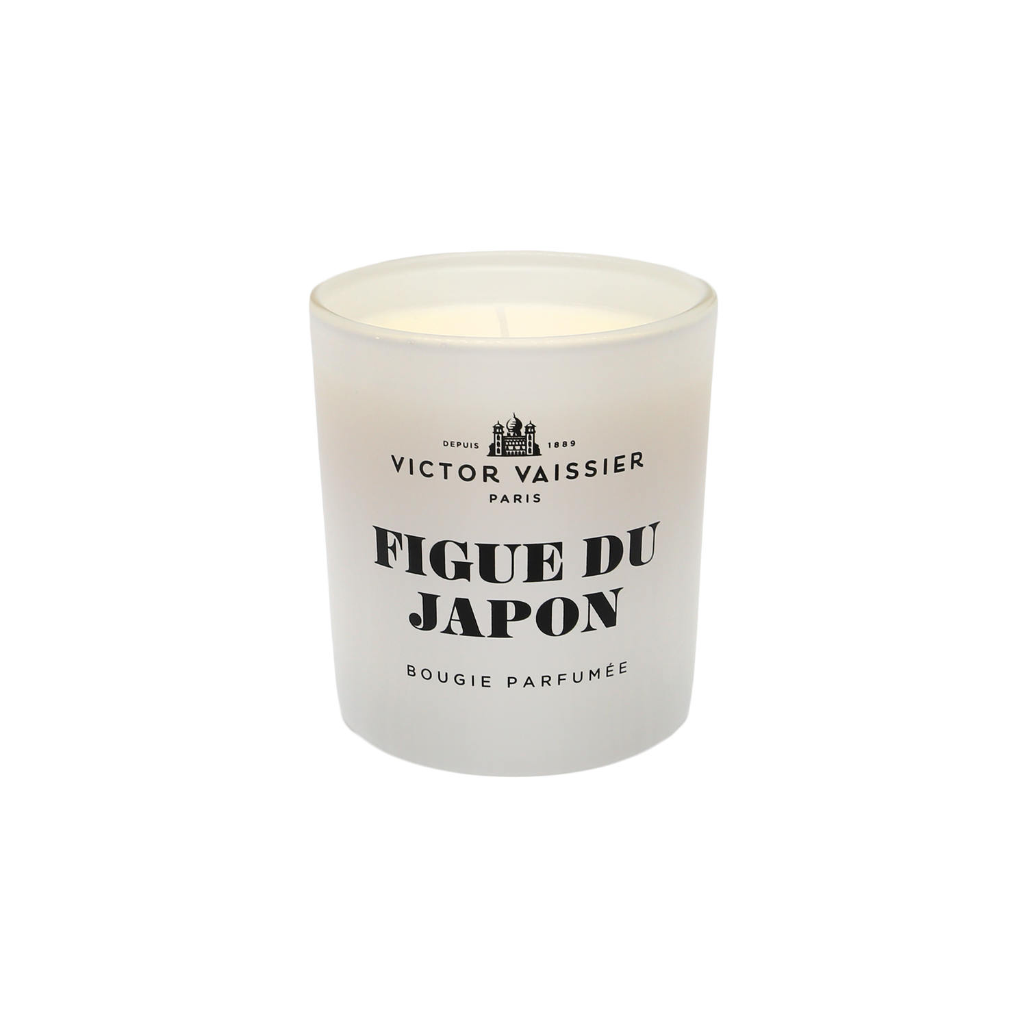 Doftljus figue du japon i glasburk med stilren etikett – exklusiv heminredning och stämningsfull doft